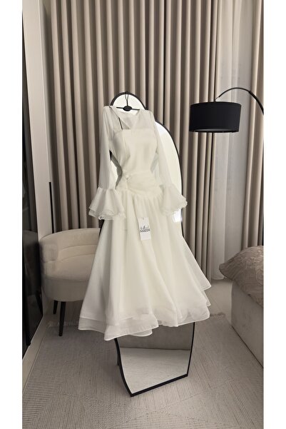 Nareen Fashion A soft white dress that combines elegance and simplicity, desi...
