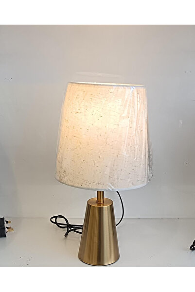 co arma A modern, traditional table lamp with a metal base, suitable for the ...