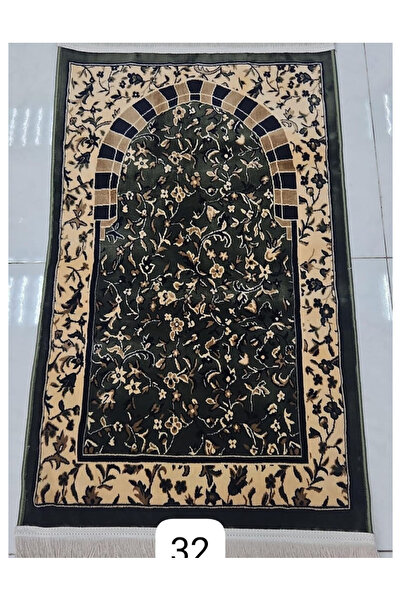 Gerenic A prayer rug in a traditional mihrab style in green and beige.