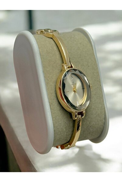 MAC CENTER ساعة يد نسائية بسوار فولاذي ذهبي اللون موديل دائري مرصع بالحجارة -...