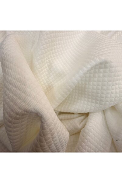 ÖZGÜR KUMAŞ KREM KAPİTONE PENYE KUMAŞ