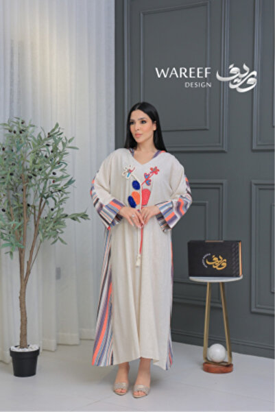 WAREEF FASHION Off-white jalabiya with colorful hand embroidery and a modern ...