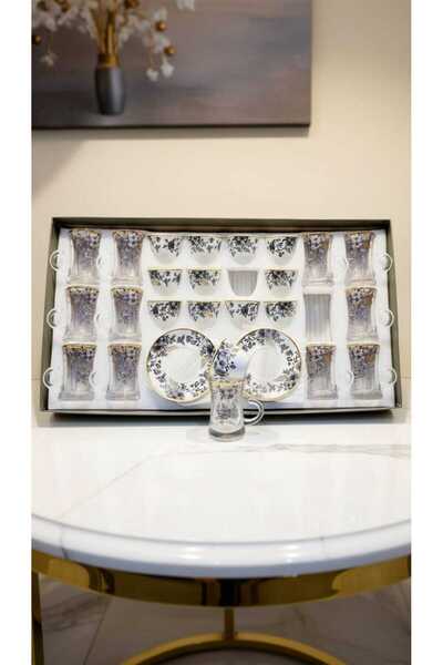 Generic A luxurious hospitality set – coffee cups and tea glasses with elegan...