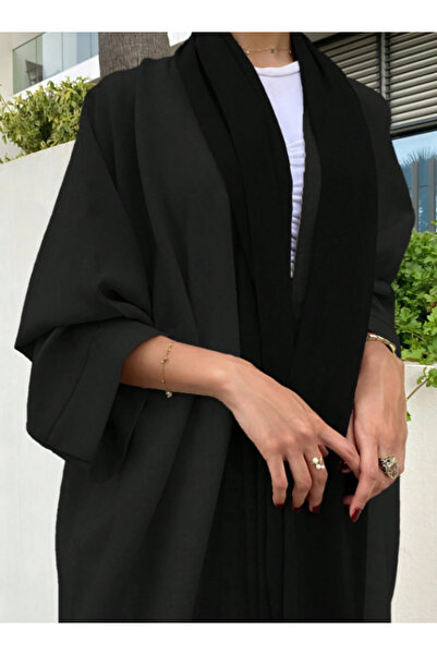 Abay-ti A simple, elegant, and casual abaya with a front slit, a long robe su...