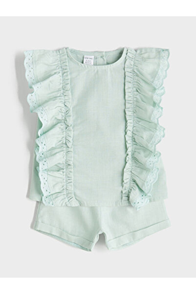 LC Waikiki مجموعة Shining Store Sparkly Choices المكونة من بلوزة وشورت مكشكش ...