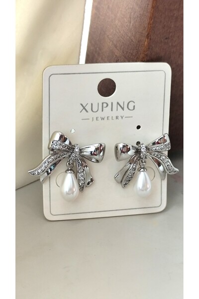 DİAVENTA TAKI VE AKSESUAR أقراط Xuping Vip - أقراط فضية على شكل فيونكة من الف...