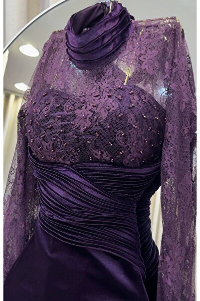 ainaqat aljawhara Elegant evening dress in dark purple