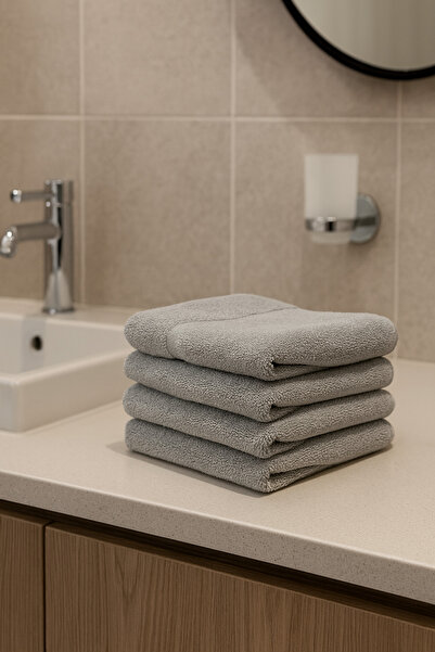 Taka Fabrics طقم مناشف قطنية 100% مكون من 4 قطع مقاس 40x70 سم باللون الرمادي ...