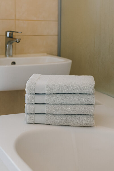 Taka Fabrics طقم مناشف قطنية 100% مكون من 4 قطع مقاس 40x70 سم باللون الرمادي ...