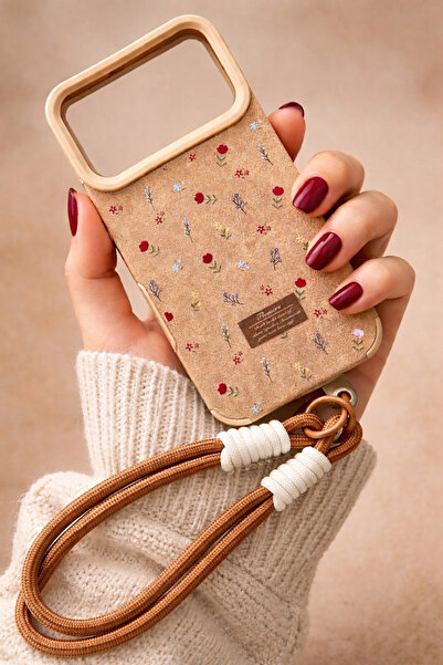 FİŞNEİLETİŞİM İPHONE 17 PROMAX ÇİÇEK DESENLİ BİLEK AKSESUARLI TABA RENGİ KILIF