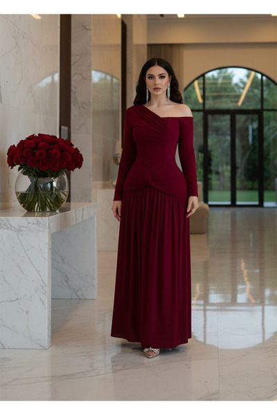 DVNA The "Venus" draped dress in burgundy – a soft draped design with an off-...
