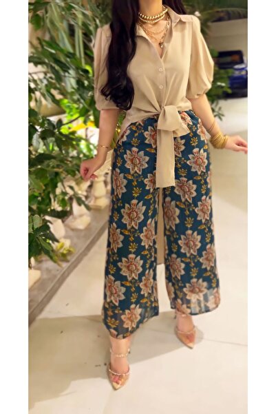 Warazan A pantsuit with a long blouse, suitable for Eid.