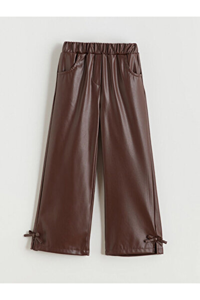 LC Waikiki RMZ GİYİM FARKIYLA بنطلون بناتي بتفاصيل فيونكة وتصميم جلدي