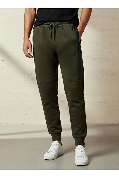 Kappa بنطال رياضي مزود بجيوب بسحابات محكمة الإغلاق حرارياً