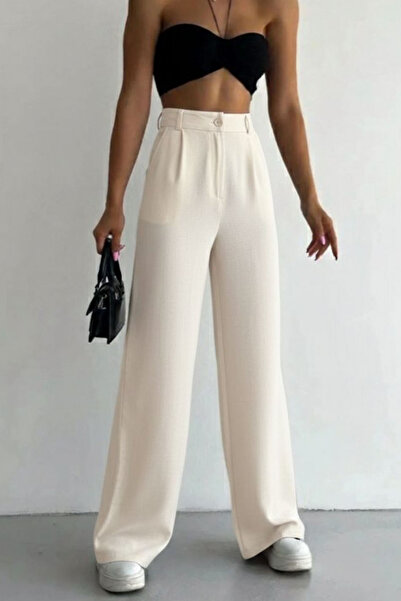 Swana Pantaloni largi din in Melaj - Crem