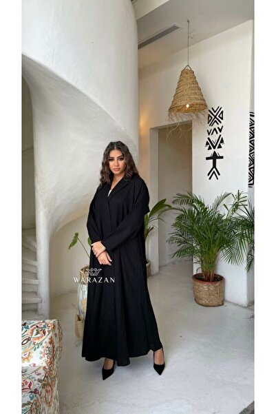 Warazan A practical abaya with pleats at the back for formal occasions