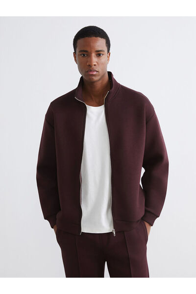 LC Waikiki سترة رياضية بسحّاب للرجال من UZG STORE بتصميم يبرز الأناقة وياقة روبا