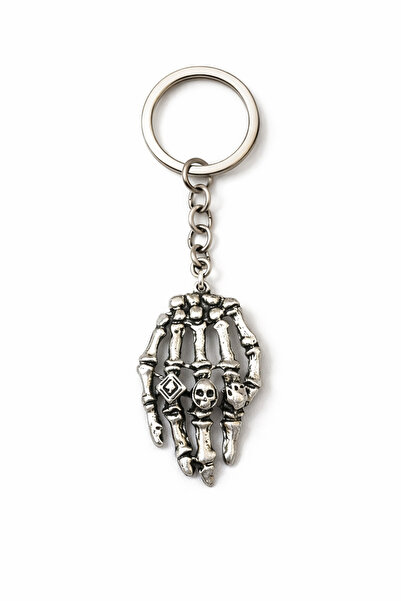 HER ŞEY NOTA www.herseynota.com Breloc metalic detaliat în formă de mână de s...