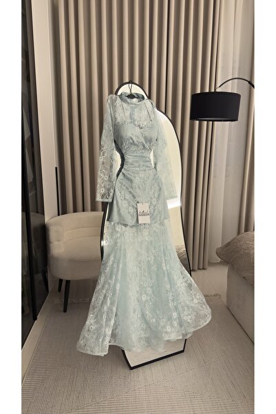 Nareen Fashion An elegant evening gown in a serene sky blue, crafted from del...