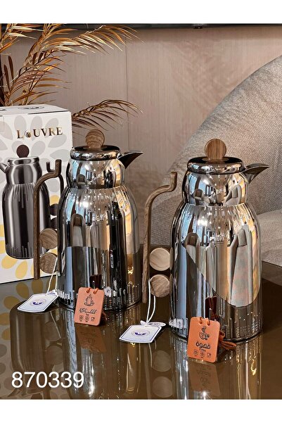 Generic A tea and coffee thermos set from the Louvre brand, featuring a moder...