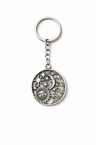 HER ŞEY NOTA www.herseynota.com Στρογγυλό μεταλλικό μπρελόκ με φιγούρες Ήλιου...