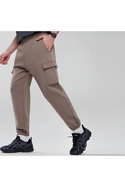 Giordano بنطال رياضي رجالي من قماش إنترلوك بقصة مريحة مدببة