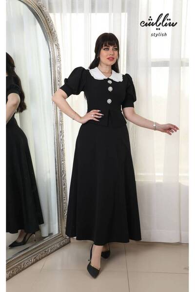 Stylish A stylish, soft dress adorned with crystal buttons