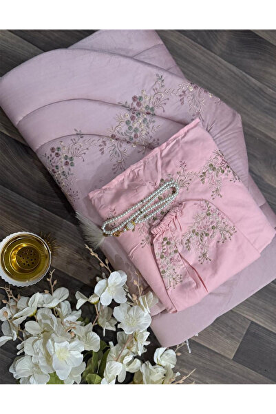 Gerenic A cream-colored embroidered women's prayer set consisting of a padded...