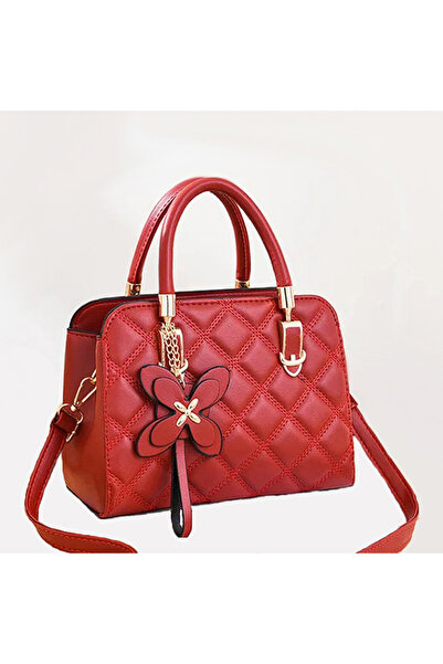 OEM Women's bag with pendant, adjustable shoulder strap and two fixed handles...