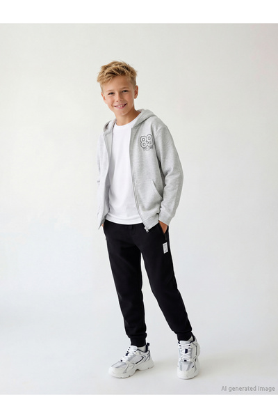 LC Waikiki بنطال رياضي أسود بخصر مطاطي للأولاد