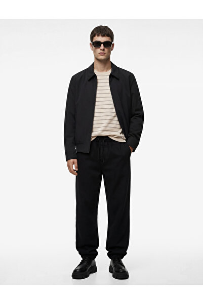 Koton بنطلون جينز فضفاض من القطن مع جيوب وحزام ربط عند الخصر