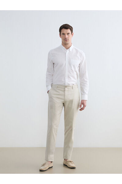 LC Waikiki بنطلون تشينو رجالي ضيق من أوزماركا للموسم الجديد