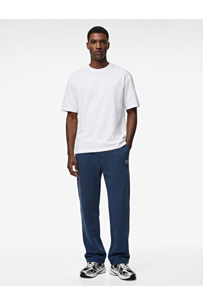 Koton Άνετη εφαρμογή με λεπτομέρεια στάμπας, επένδυση fleece Αθλητικό παντελό...