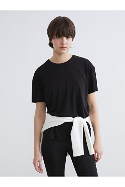 LC Waikiki تي شيرت رياضي نسائي فضفاض بياقة روبا من UZG STORE للنساء الأنيقات