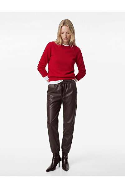 Koton بنطلون من الجلد الصناعي مع جيوب جانبية وحزام خصر مطاطي