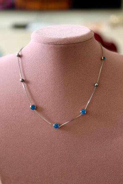 Trendy Butik قلادة العين الشريرة المصنوعة من الفولاذ باللون الفضي