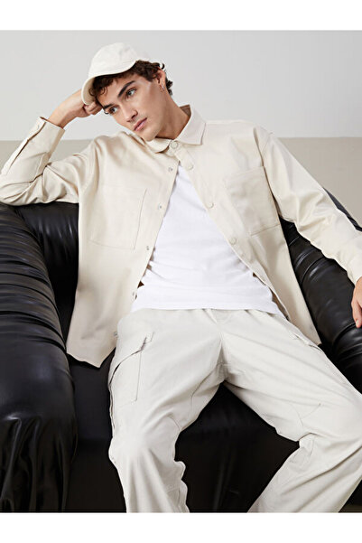 LC Waikiki قميص رجالي بأكمام طويلة من UZG STORE يتميز بتصميم مريح وعصري