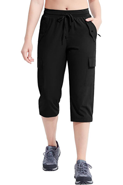 OEM Women's breathable sports pants with pockets and elastic waist, 3/4 lengt...