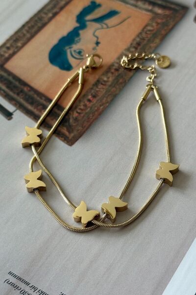 Trendy Butik سوار الفولاذ متعدد الفراشة