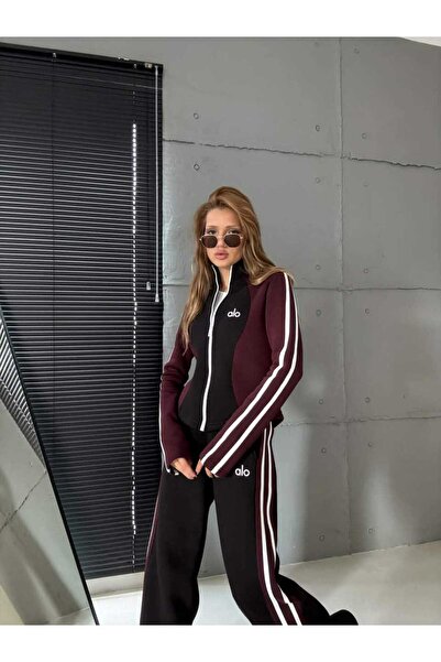 Alo Modern women's tracksuit with zipper and side stripes, comfortable for sp...