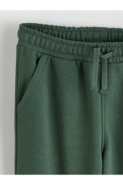 LC Waikiki Πράσινο φούτερ με ριγέ λαιμόκοψη και αθλητικό παντελόνι για αγόρια