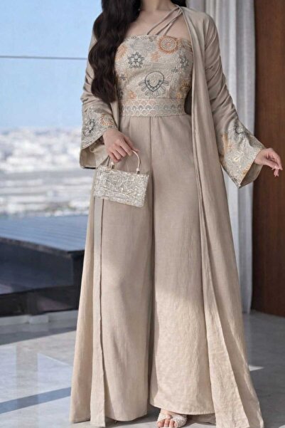 Jood Ramadan overalls with a bisht