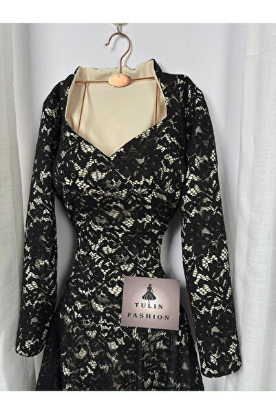 Genenic A dress made of Teoni lace and lined with Barbie fabric.