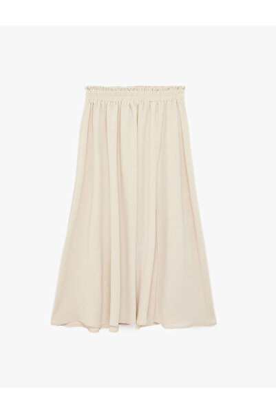 Koton Fusta midi tip clopot, confortabilă, din țesătură Aerobin, cu talie ela...