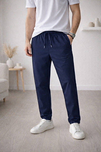 Exclusive Season Men's sports sweatpants, elastic waist, stretchy material, l...
