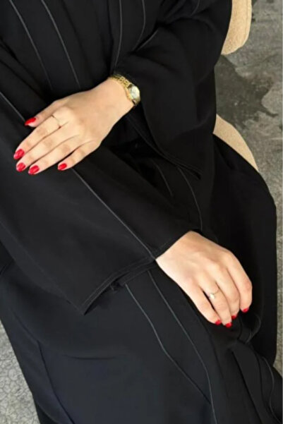 Abay-ti Elegant plain abaya with a sophisticated design, made of high-quality...