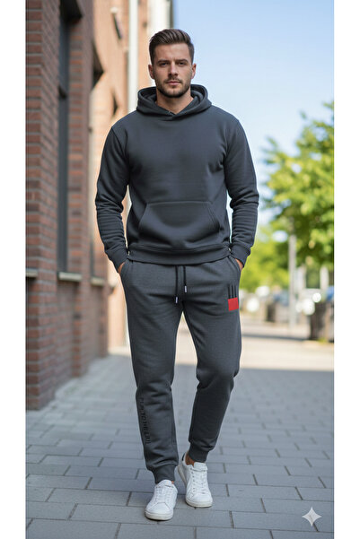 Pomaxi Men's dark gray sweatpants with red details and "PLAY TO THE LIMIT" print