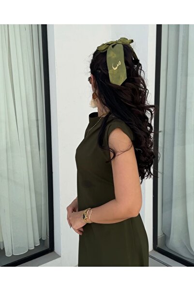 outline A stylish hair tie with your favorite letter (letter M)