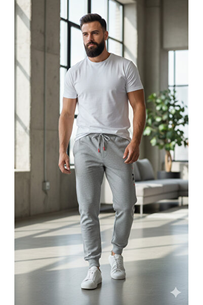 Pomaxi Men's light gray sweatpants with "LIFE AIR" print