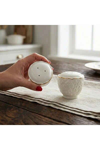 FAIR HOME طقم من 2 ملحية مصنوعة من البورسلين بلون كريمي مع تفاصيل منقوشة بالل...